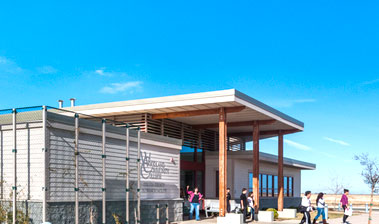 Exterior of Colusa County Campus with students leaving class