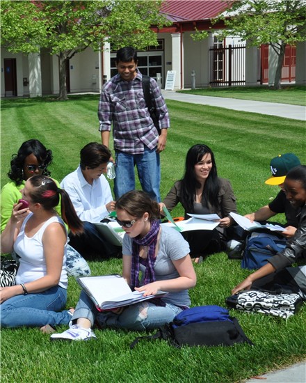 Photo of WCC Students Studying on Campus Lawn
