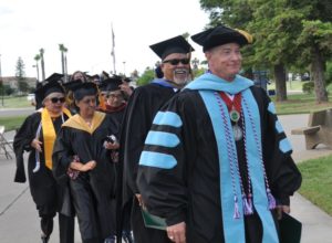 YCCD Chancellor Douglas Houston leading commencement procession at Woodland Community College