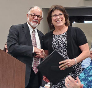 Dr. jan Ponticelli Receives Board Resolution from Dr. Javaheripour